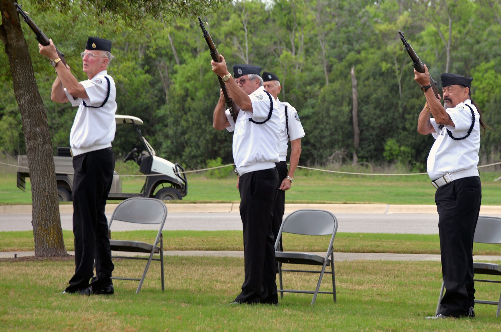 Members of the Memorial Services Detachment render honors by volleys of rifle fire near the conclusion of the ceremony for the 50th Anniversary of the Commemoration of the Vietnam War at the Fort Sam Houston National Cemetery March 27.