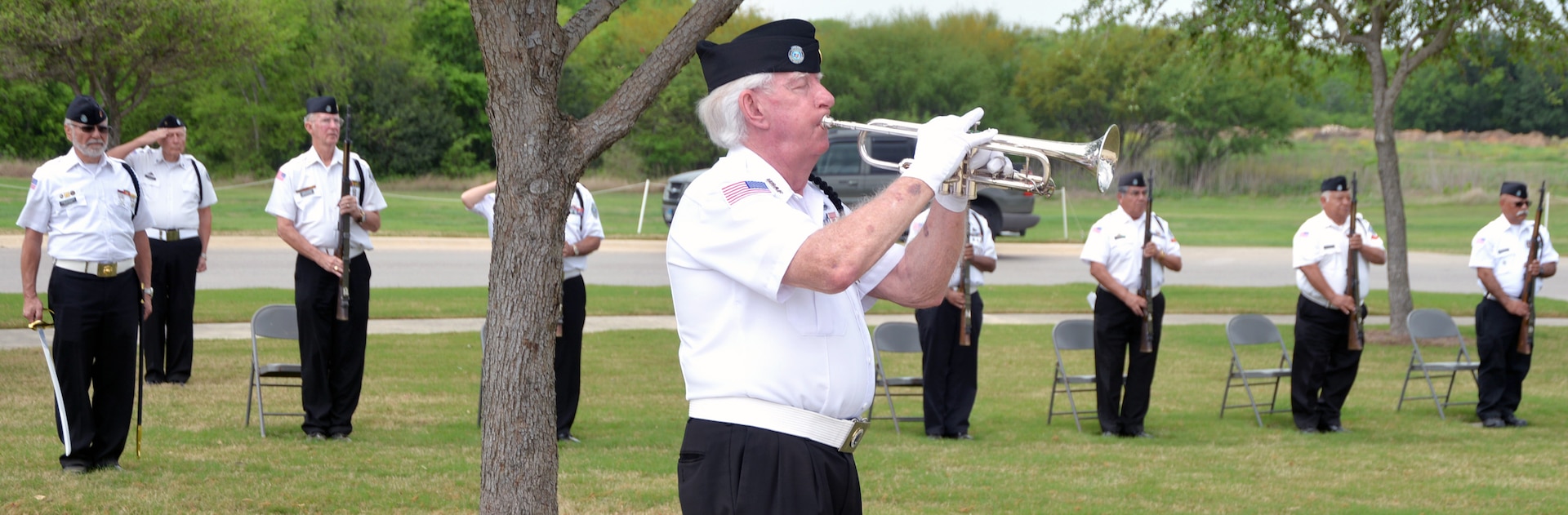A member of the Fort Sam Houston Memorial Services Detachment plays "Taps" near the end of the ceremony for the 50th Anniversary of the Commemoration of the Vietnam War at the Fort Sam Houston National Cemetery March 27.