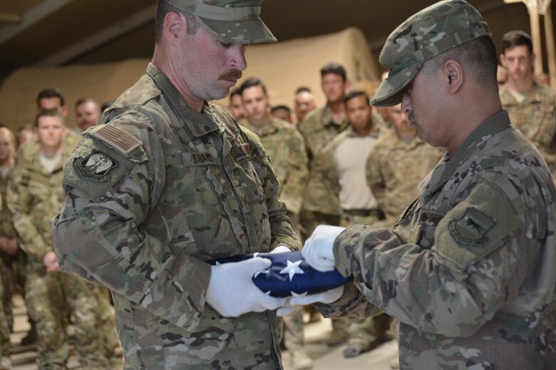 The seven men who died March 15 in a HH-60 Pave Hawk helicopter that crash in western Iraq were honored in a memorial ceremony at an undisclosed location in Southwest Asia March 21, 2018.