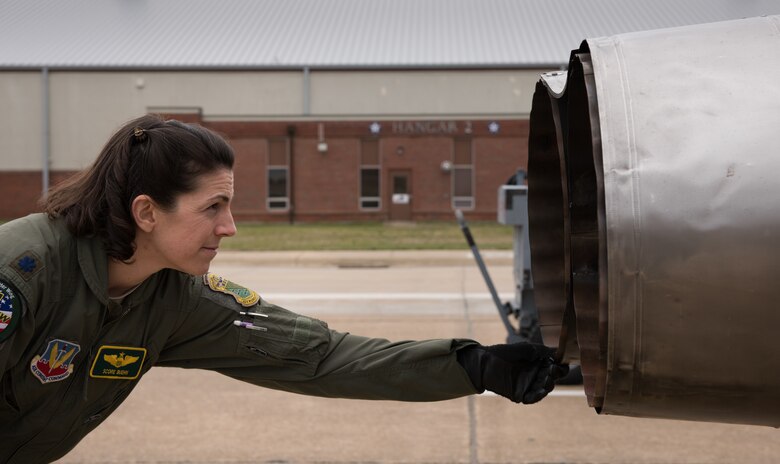 U.S. Air Force Lt. Col. Cheryl Buehn, 71st Fighter Training Squadron T-38A Talon nstructor pilot, poses in front of T-38A Talons at Joint Base Langley-Eustis, Virginia, March 27, 2018.