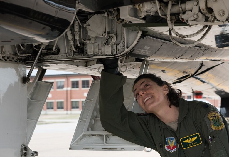 U.S Air Force Lt. Col. Cheryl Buehn, 71st Fighter Training Squadron T-38A Talon instructor pilot, performs preflight inspections on a T-38A Talon at Joint Base Langley-Eustis, Virginia, March 27, 2018