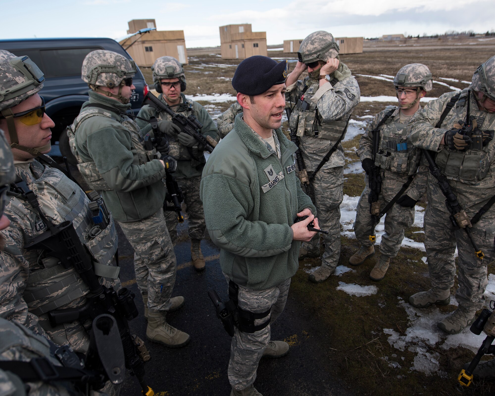 Tech. Sgt. Jordan Barnes, 141st Security Forces Squadron security forces specialist, briefs a fire team prior to entering the Urban Evasion Laboratory training facility March 9, 2018 at Fairchild Air Force Base, Wash. The Guardsmen practiced several training scenarios while conducting the training to include moving a squad within the UEL to secure the area from hostile forces in order to set up a bare base of operations. (U.S. Air National Guard photo by Staff Sgt. Rose M. Lust)