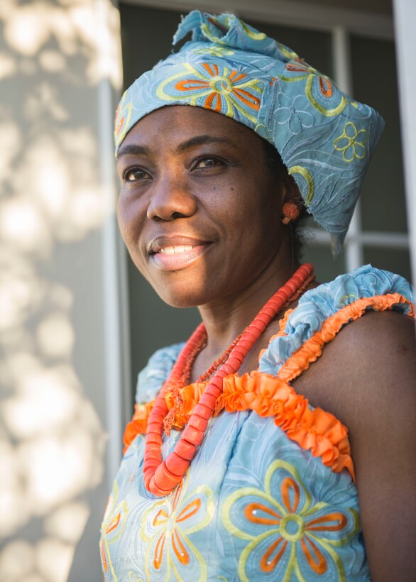 U.S. Army Master Sgt. Monica Salamiiyile, Headquarters Training and Doctrine Command human resources specialist, wears traditional Nigerian clothes and jewelry at Joint Base Langley-Eustis, Virginia., March 23, 2018. Salamiiyile’s family in Nigeria mails her dresses to keep her connected and current on African-inspired fashion.(U.S. Air Force photo by Airman 1st Class Monica Roybal)