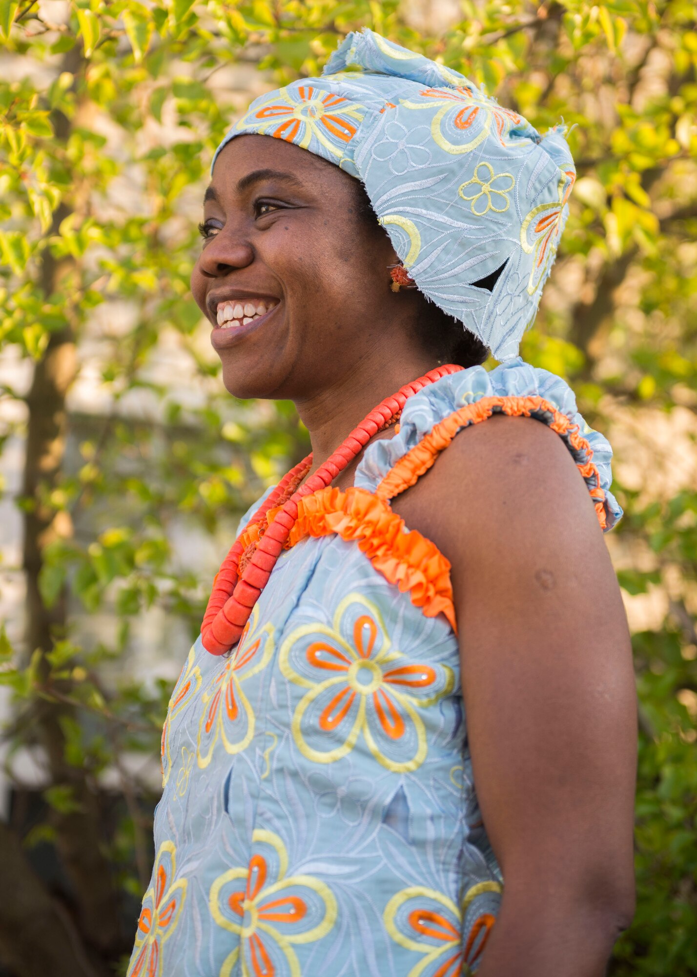 U.S. Army Master Sgt. Monica Salamiiyile, Headquarters Training and Doctrine Command human resources specialist, wears native clothes at Joint Base Langley-Eustis, Virginia, March 23, 2018. The orange Ivie beads signify she is from the city of Benin.. (U.S. Air Force photo by Airman 1st Class Monica Roybal)