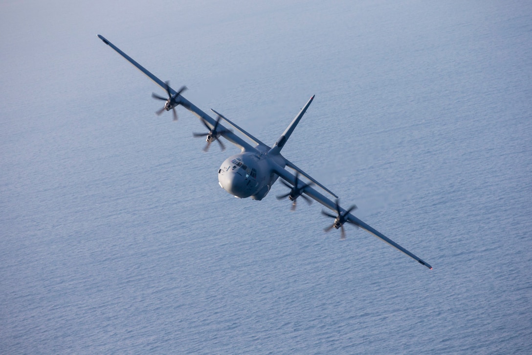A U.S. Air Force C-130J Super Hercules assigned to the 36th Airlift Squadron flies near Suruga Bay
