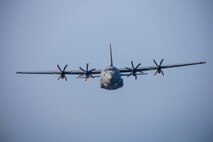 A U.S. Air Force C-130J Super Hercules assigned to the 36th Airlift Squadron flies over the Izu Peninsula