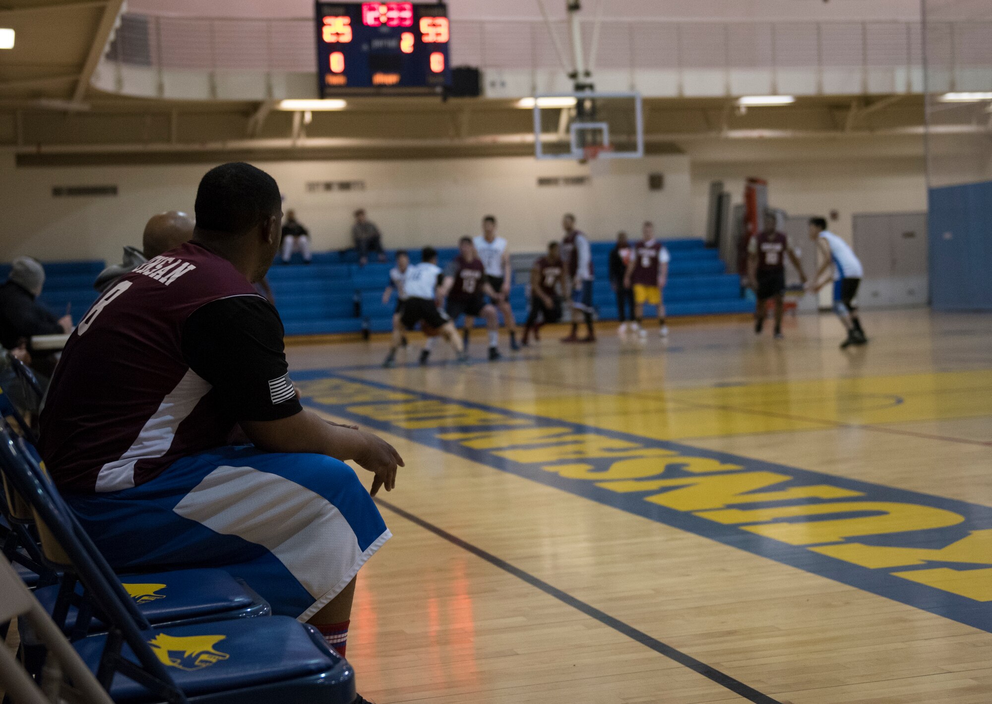 U.S. Air Force Airmen and Republic of Korea Air Force Airmen play a game of basketball during an intramural sporting event January 22, 2018, at Kunsan Air Base, Republic of Korea. Kunsan Air Base’s intramural basketball season just recently wrapped up and this season marked the first time members of the ROKAF have participated in the Wolf Pack’s unit versus unit competition. (U.S. Air Force photo by Tech. Sgt. Josh Rosales)