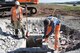 Wislaw and Dirk, German contract workers, lay the foundation for the new infield drainage project on the flightline on Ramstein Air Base, Germany, Sept. 21, 2017. Wislaw and Dirk were part of a six-man team working on the initial phase of the project.