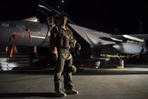 Lt. Col. Trinidad “Moses” Meza, 336th EFS deputy operations group commander and weapons system officer, poses for a photo after landing in an F-15E Strike Eagle March 21, 2018, at an undisclosed location in Southwest Asia.