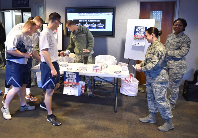 Airmen learn more about the Air Force Assistance Fund during the Joint Base Charleston Air Force Assistance Fund Campaign Kicked off March 27, 2018.
