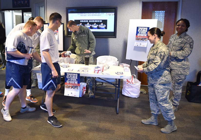Airmen learn more about the Air Force Assistance Fund during the Joint Base Charleston Air Force Assistance Fund Campaign Kicked off March 27, 2018.