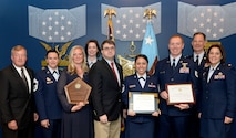 Members of the 919th Special Operations Force Support Squadron's Airman and Family Readiness Center team display their 2017 Department of Defense Reserve Family Readiness Awards