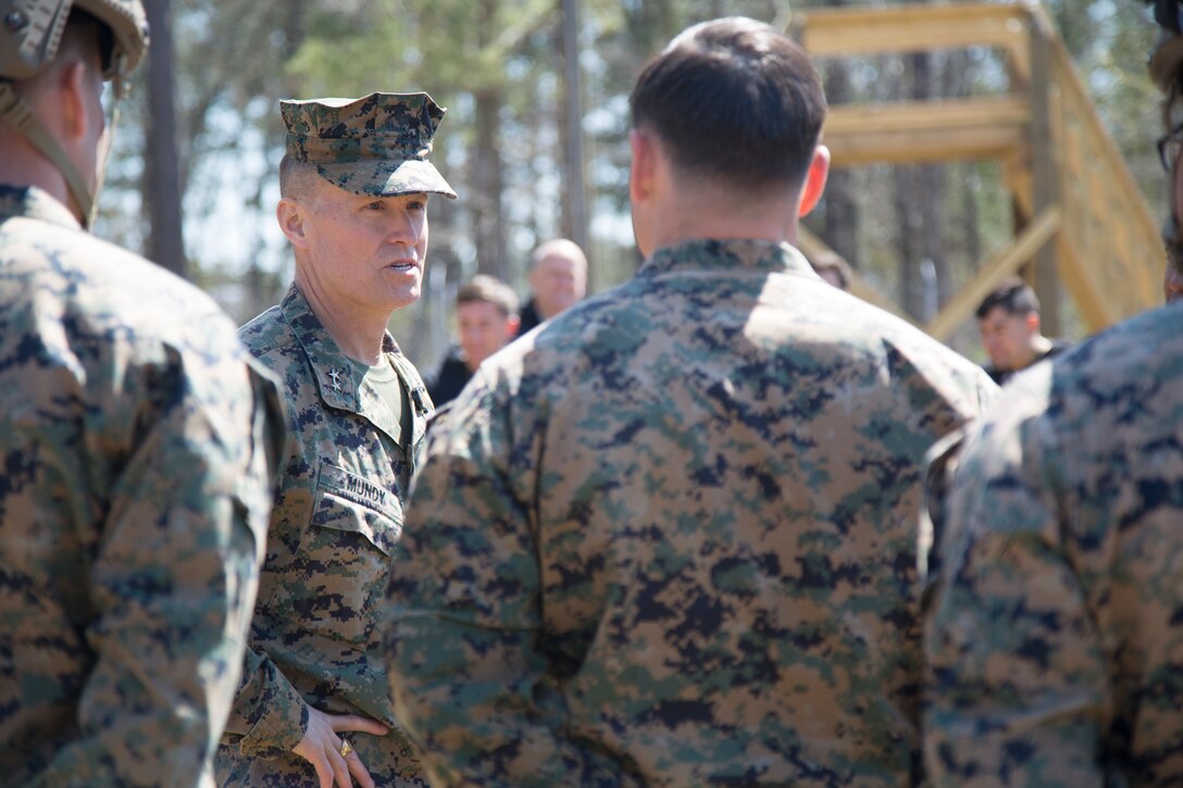 Major General Carl E. Mundy III, commander of U.S. Marine Corps Forces, Special Operations Command, visits students in the MARSOC Combat Support Orientation Course at the multipurpose canine training facility aboard Marine Corps Base Camp Lejeune, N.C., March 22, 2018. MCSOC is designed to provide Marines interested in serving a tour of duty at MARSOC as a special operations capability specialist with the knowledge of what professional, mental, and physical attributes are desired for a potential assignment to MARSOC. (U.S. Marine Corps photo by Cpl. Bryann K. Whitley/released)