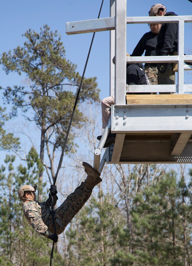 A student in U.S. Marine Corps Forces, Special Operations Command’s Combat Support Orientation Course rappels off a tower at the multipurpose canine training facility aboard Marine Corps Base Camp Lejeune, N.C., March 22, 2018. Marines who attend MCSOC learn about MARSOC duty assignments within their military occupational specialty; receive in-depth training on strength, conditioning and injury prevention; and advanced MOS skills and training to allow MARSOC the ability to identify the best-qualified candidates for potential assignment. (U.S. Marine Corps photo by Cpl. Bryann K. Whitley/released)