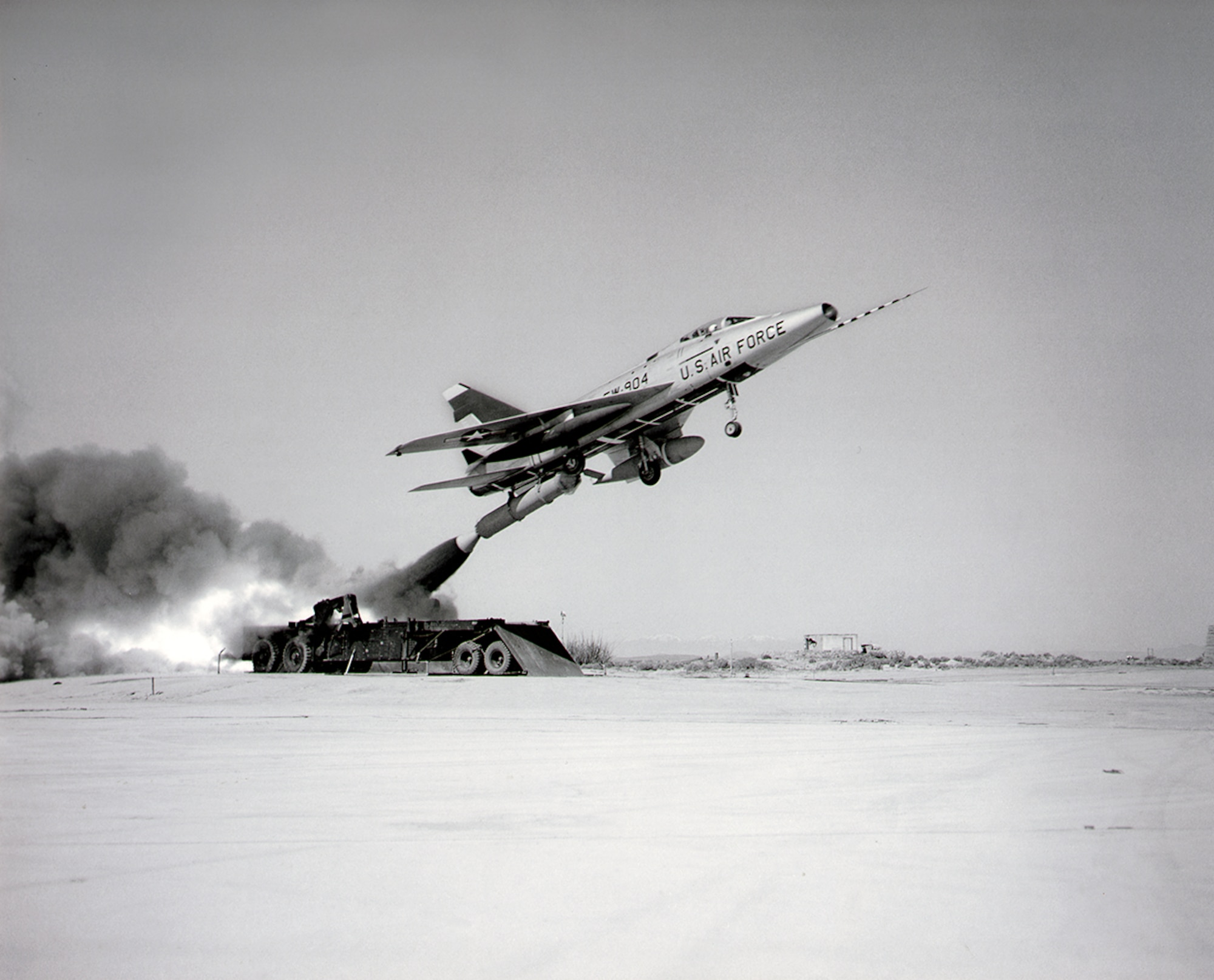 #OTD 26 Mar 1958 at Edwards - First launch of the Zero Length Launch (ZEL) program, of an F-100D took place from a truck-mounted launcher.  North American test pilot Albert W. Blackburn was at the controls.  A follow-on to the ZELMAL program, ZEL was designed to launch tactical fighter planes in case of the loss of their traditional runways.