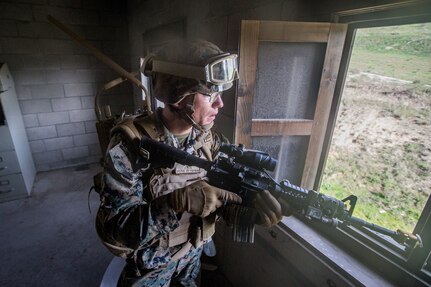 U.S. Marine Corps Lance Cpl. Patrick Giblin, an infantryman with the 3rd Battalion, 4th Marine Regiment, 1st Marine Division, wears a concept communication system during Urban Advanced Naval Technology Exercise 2018 (ANTX18) at Marine Corps Base Camp Pendleton, California, March 21, 2018. The Marines are testing next generation technologies to provide the opportunity to assess the operational utility of emerging technologies and engineering innovations that improve the Marine’s survivability, lethality and connectivity in complex urban environments. (U.S. Marine Corps photo by Lance Cpl. Rhita Daniel)