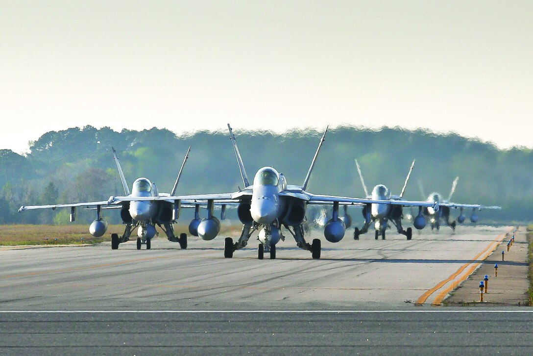 F/A-18C Hornets taxi down the flight line aboard Marine Corps Air Station Beaufort, March 22.