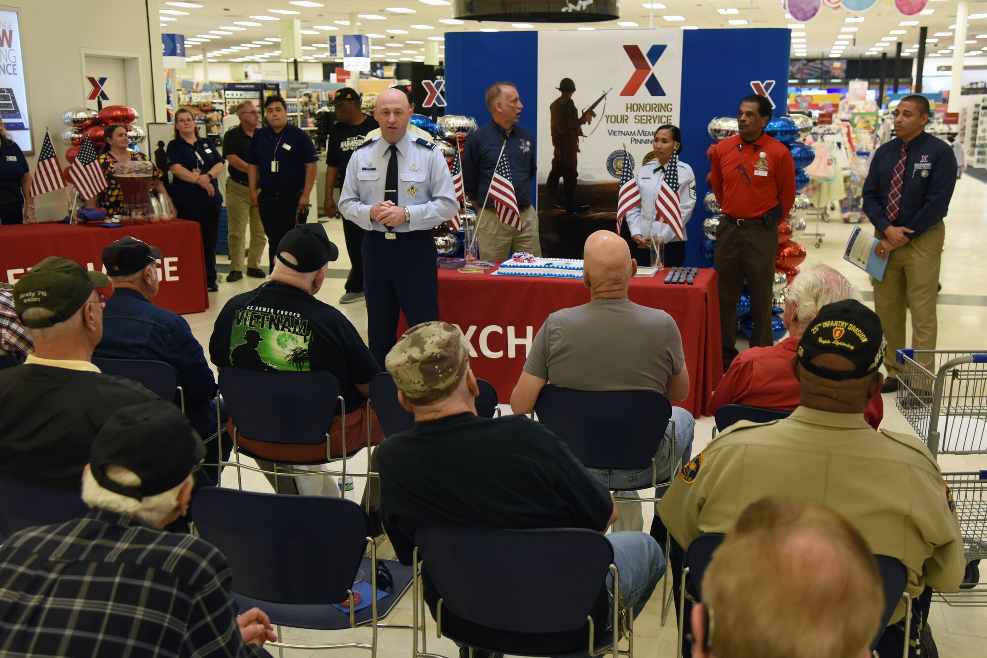 U.S. Air Force Col. Danny Davis, 81st Mission Support Group commander, delivers remarks during the 50th Anniversary Vietnam Memorial Pinning Day at The  Exchange March 29, 2018, on Keesler Air Force Base, Mississippi. The event, which included a cake cutting ceremony and commemorative lapel pin presentation, was held to honor Vietnam veterans for their service. (U.S. Air Force photo by Kemberly Groue)