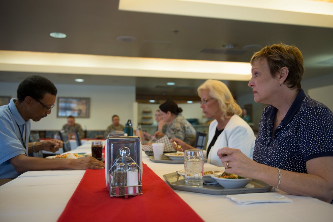 Guests enjoy lunch during the Women's Mentoring Panel Mar. 21, 2018, at Luke Air Force Base, Ariz.. The panel included guest speakers who detailed their accomplishments both in the Air Force and in their family and civilian lives as women. (U.S. Air Force photo by Senior Airman Ridge Shan)