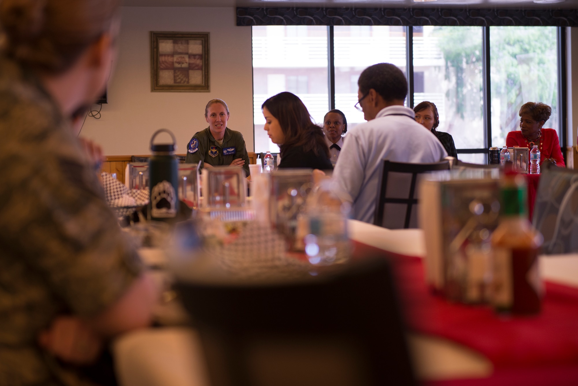 Lt. Col. Kathryn Gaetke, 309th Fighter Squadron commander, speaks to the crowd during the Women's Mentoring Panel Mar. 21, 2018, at Luke Air Force Base, Ariz.. Gaetke detailed her early years in the Air Force and her ascension into command over an F-16 fighter squadron. (U.S. Air Force photo by Senior Airman Ridge Shan)