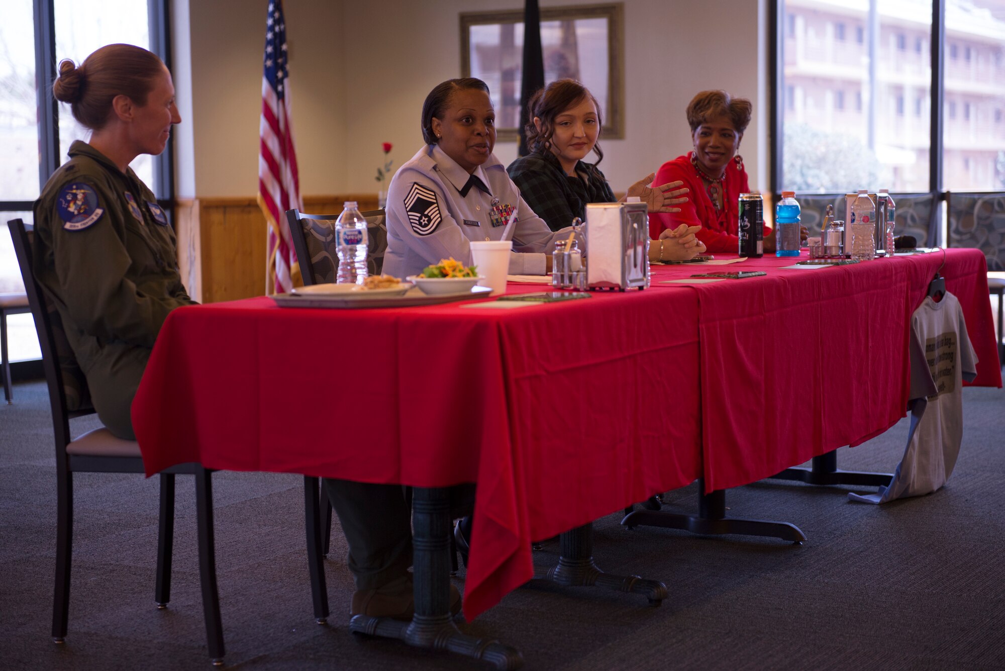 Chief Master Sgt. Marjon Robertson, 56th Fighter Wing Inspector General superintendent, second from left, speaks to guests at the Women's Mentoring Panel about her accomplishments and life experiences Mar. 21, 2018, at Luke Air Force Base, Ariz. Robertson enlisted in the Air Force while working part-time jobs early in her career in order to care for her family. (U.S. Air Force photo by Senior Airman Ridge Shan)