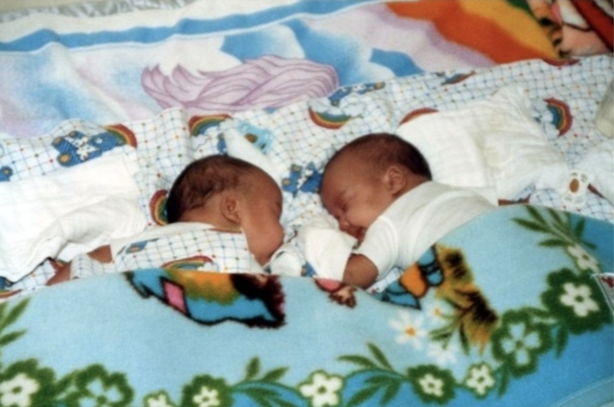 Julien and Daniel Adams take a nap at their home in Japan in 1987. The brothers now serve as U.S. Air Force captains. Julien is a B-1 Lancer weapon systems officer assigned to the 34th Bomb Squadron at Ellsworth Air Force Base, S.D., and Daniel is a B-52 Stratofortress weapon systems officer assigned to the 69th BS at Minot AFB, N.D. Julien is approximately one minute older than Daniel, but the younger brother has three more years as a qualified aircrew member. (Courtesy photo)