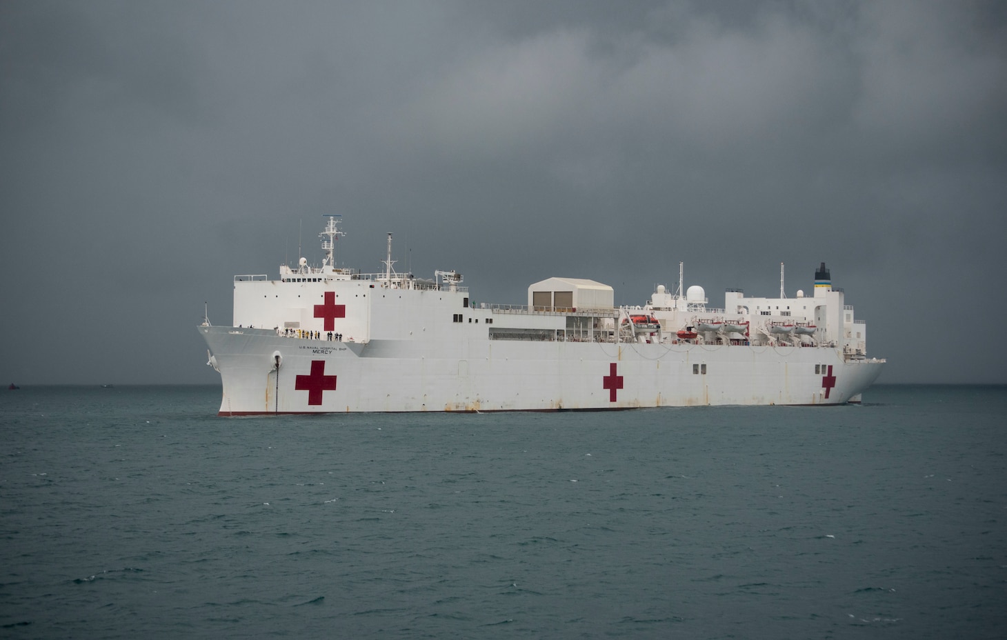 180329-N-OU129-032 SINGAPORE (Mar. 29, 2018) Military Sealift Command hospital ship USNS Mercy (T-AH 19) anchors near Bengkulu, Indonesia March 29. Mercy is currently deployed in support of pacific Partnership 2018 (PP18). PP18’s mission is to work collectively with host and partner nations to enhance regional interoperability and disaster response capabilities, increased stability and security in the region, and foster new and enduring friendships across the Indo-Pacific Region. Pacific Partnership, now in its 13th iteration, is the largest annual multinational humanitarian assistance and disaster relief preparedness mission conducted in the Indo-Pacific. (U.S. Navy photo by Mass Communication Specialist 2nd Class Joshua Fulton/Released)