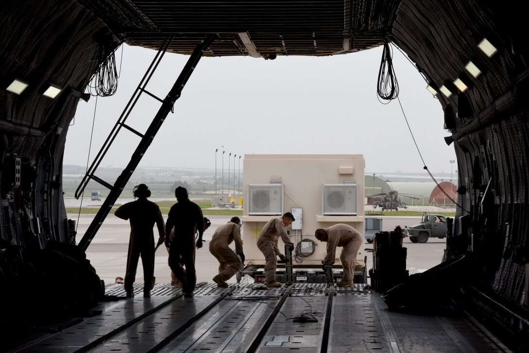 This 78,000 pound deployable shelter was one of three temporary armories transported with assistance from the 728th Air Mobility Squadron. (U.S. Air Force photo by Staff Sgt. Rebeccah Woodrow)