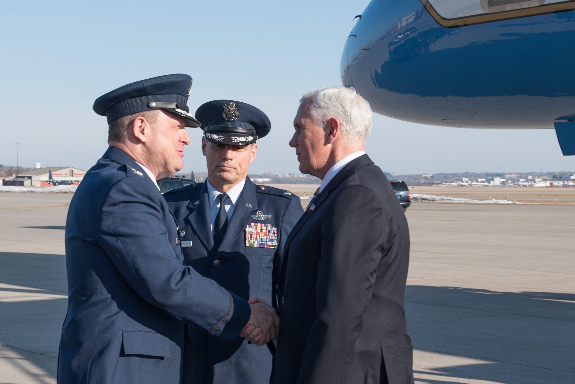 Vice President Mike Pence is greeted by Col. Craig Petersen, 934th Mission Support Group commander (left) and Col. Tony Polashek, 934th Airlift Wing commander, at the 934th Airlift Wing March 27. (Air Force Photo/Master Sgt. Eric Amidon)