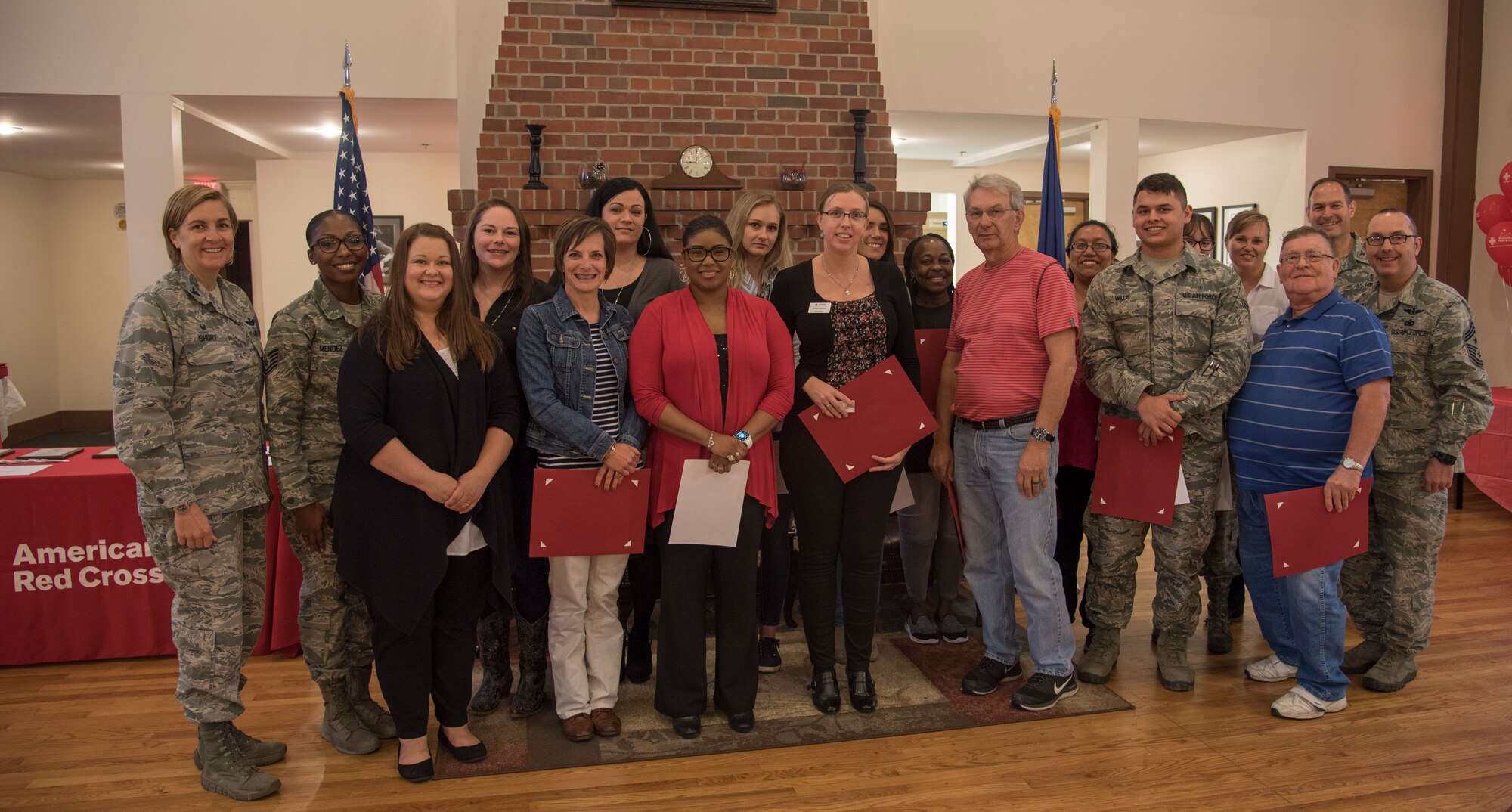 American Red Cross volunteers from Moody Air Force Base and Moody leadership pose for a photo, March 26, 2018, at Moody Air Force Base, Ga. Volunteers from Moody were recognized for their service to the American Red Cross. (U.S. Air Force photo by 1st Lt. Kaitlin Toner)