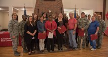 American Red Cross volunteers from Moody Air Force Base and Moody leadership pose for a photo, March 26, 2018, at Moody Air Force Base, Ga. Volunteers from Moody were recognized for their service to the American Red Cross. (U.S. Air Force photo by 1st Lt. Kaitlin Toner)
