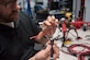 Space and Naval Warfare Systems Center (SSC) Atlantic employee Chad Sullivan tins the wire for a new battery lead to install on an unmanned aerial vehicle (UAV). Sullivan is a member of the SSC Atlantic Unmanned Systems Research (SAUSR) Range team which is working with the Defense Advanced Research Projects Agency (DARPA) to get autonomous technology in the hands of warfighters. SSC Atlantic develops, acquires and provides life cycle support for command, control, communications, computer, intelligence, surveillance and reconnaissance (C4ISR) systems, information technology and space capabilities. A leading-edge Navy engineering center, SSC Atlantic designs, builds, tests, fields and supports many of the finest frontline C4ISR systems in use today, and those being planned for the future.