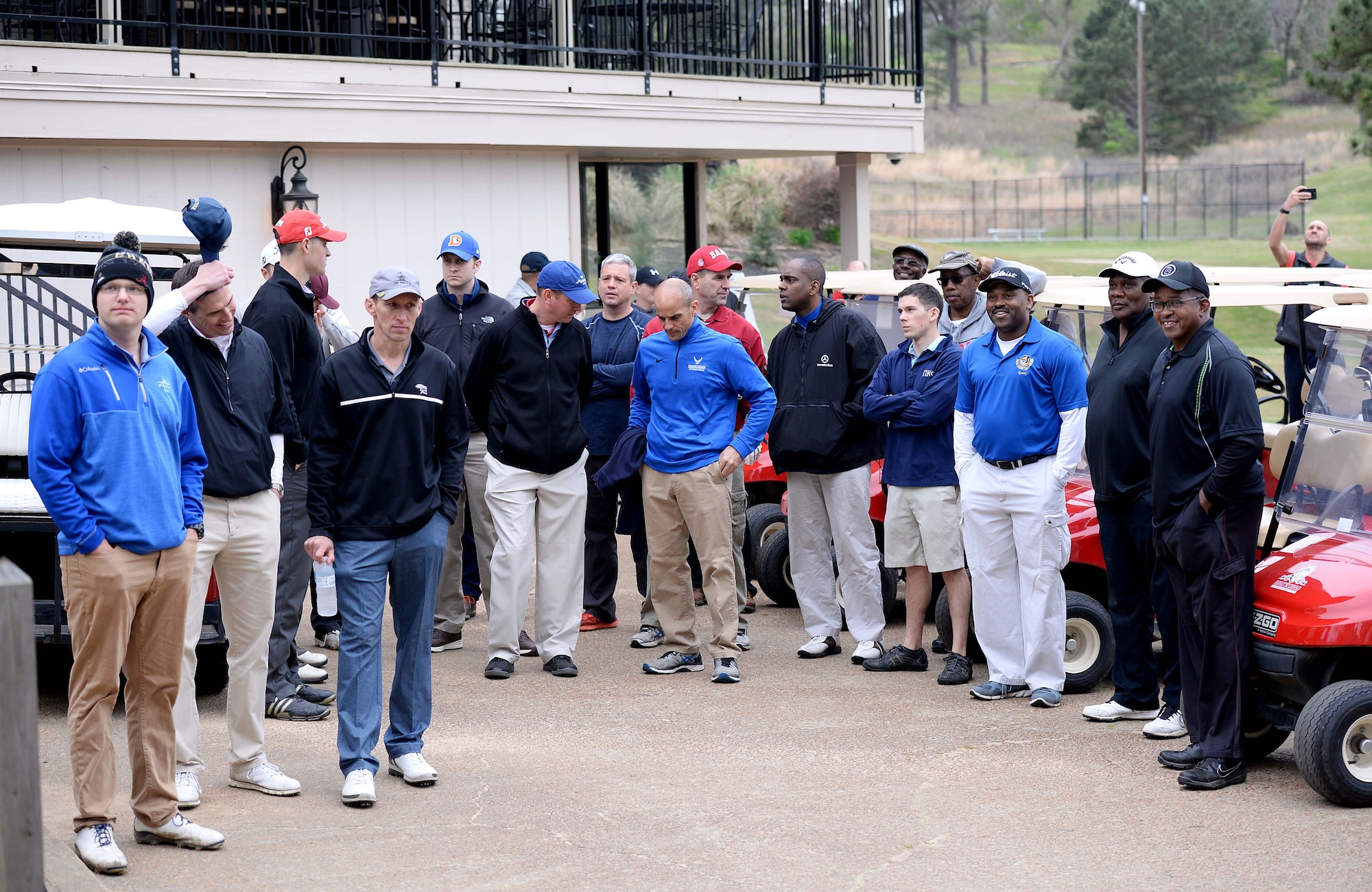 Participants wait for the starting announcements of the Happy Irby Golf Tournament March 29, 2018, at the Lion Hills Country Club in Columbus, Mississippi. George Irby continues his father's legacy in the Columbus community and is always finding new ways to expand fundraising to help children in need. (U.S. Air Force photo by Airman 1st Class Keith Holcomb)