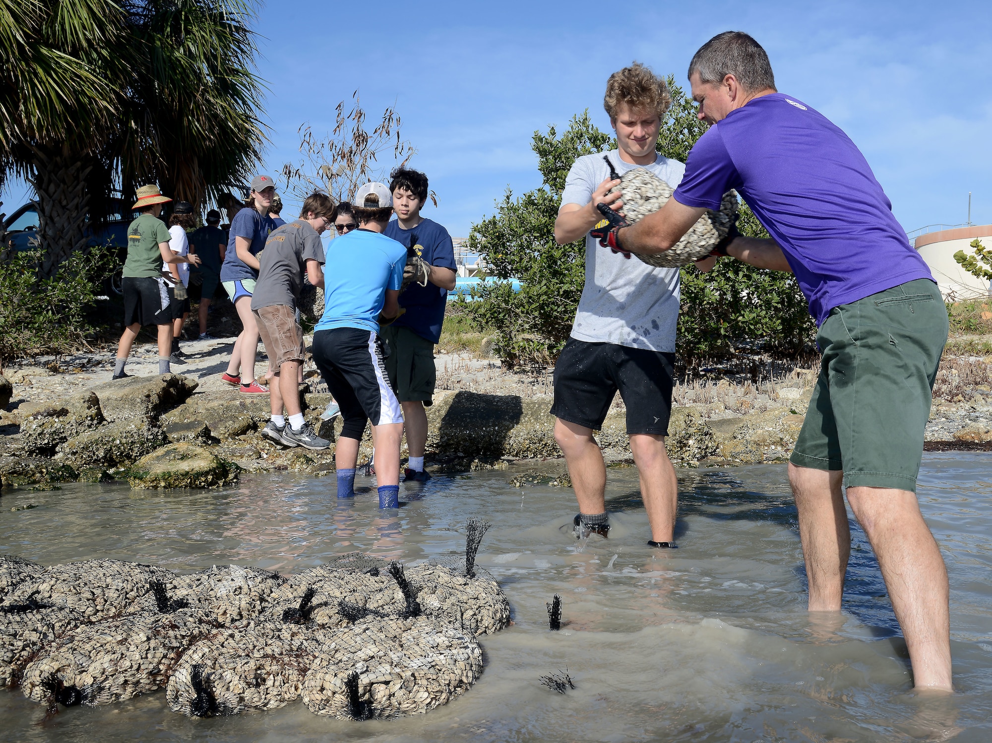 Members of MacDill and the local community build oyster reefs at MacDill Air Force Base, Fla., March 30, 2018.