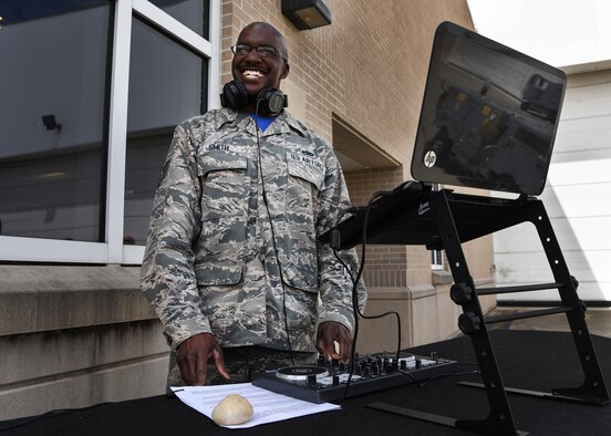 U.S. Air Force Technical Sgt. Henry Smith, 33rd Aircraft Maintenance Squadron inspection monitor, plays music March 30, 2018, at Eglin Air Force Base, Fla. Smith is a DJ that performs at numerous events on and off base. (U.S. Air Force photo by Airman 1st Class Emily Smallwood/Released)