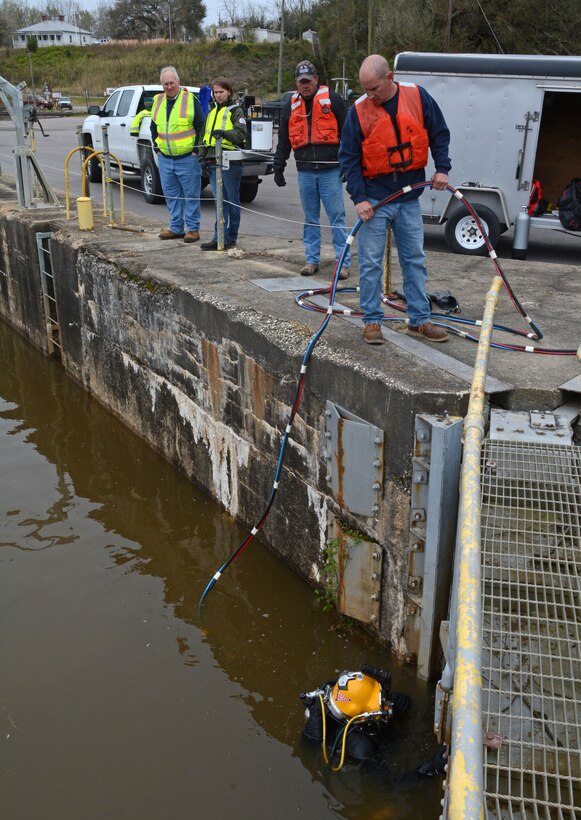 Divers from the U.S. Army Corps of Engineers (USACE) Huntington (W.V.) District recently completed inspections of Locks and Dams 1, 2 and 3 on the Cape Fear River. The divers check for wear and tear on the mechanical gear that opens and closes the locks, as well as routine maintenance.