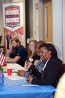 Retired Col. Stephanie Wilson, right, former 72nd Air Base Wing commander, was one of five military veteran panelists at the Home Away From Home "Meet the Heroes Night" held at the American Red Cross in downtown Oklahoma City on March 22.