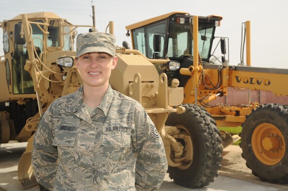 Tech. Sgt. Christy M. Enriquez, a Reserve Citizen Airman with the 940th Civil Engineer Squadron, stands in front of heavy equipment March 30, 2018, at Beale Air Force Base, California.