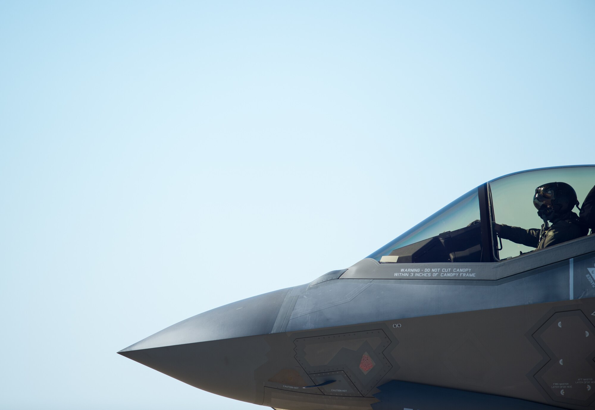 U.S. Air Force Capt. Andrew "Dojo" Olson, F-35 Heritage Flight Team pilot, maneuvers an F-35A Lightning II during the U.S. Air Force Heritage Flight Training Course at Davis-Monthan Air Force Base, Ariz., March 2, 2018. The HFTC allows civilian pilots and active duty military pilots to practice flying in close formations in preparation for public air shows. (U.S. Air Force photo by Airman 1st Class Alexander Cook)