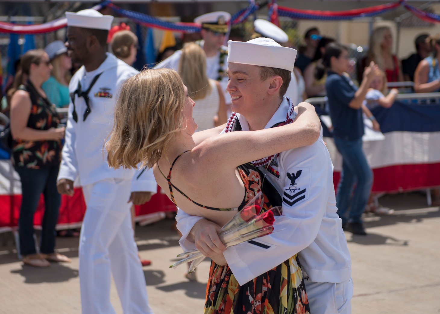 180330-N-LY160-0135 PEARL HARBOR, Hawaii (March 30, 2018) Sonar Technician Submarine 2nd Class Michael Mize, assigned to the Virginia-class fast-attack submarine USS Mississippi (SSN 782), hugs his loved during a homecoming ceremony in Joint Base Pearl Harbor-Hickam, March 30. Mississippi successfully completed a six-month Western Pacific deployment. (U.S. Navy photo by Mass Communication Specialist 2nd Class Michael H. Lee/ Released)
