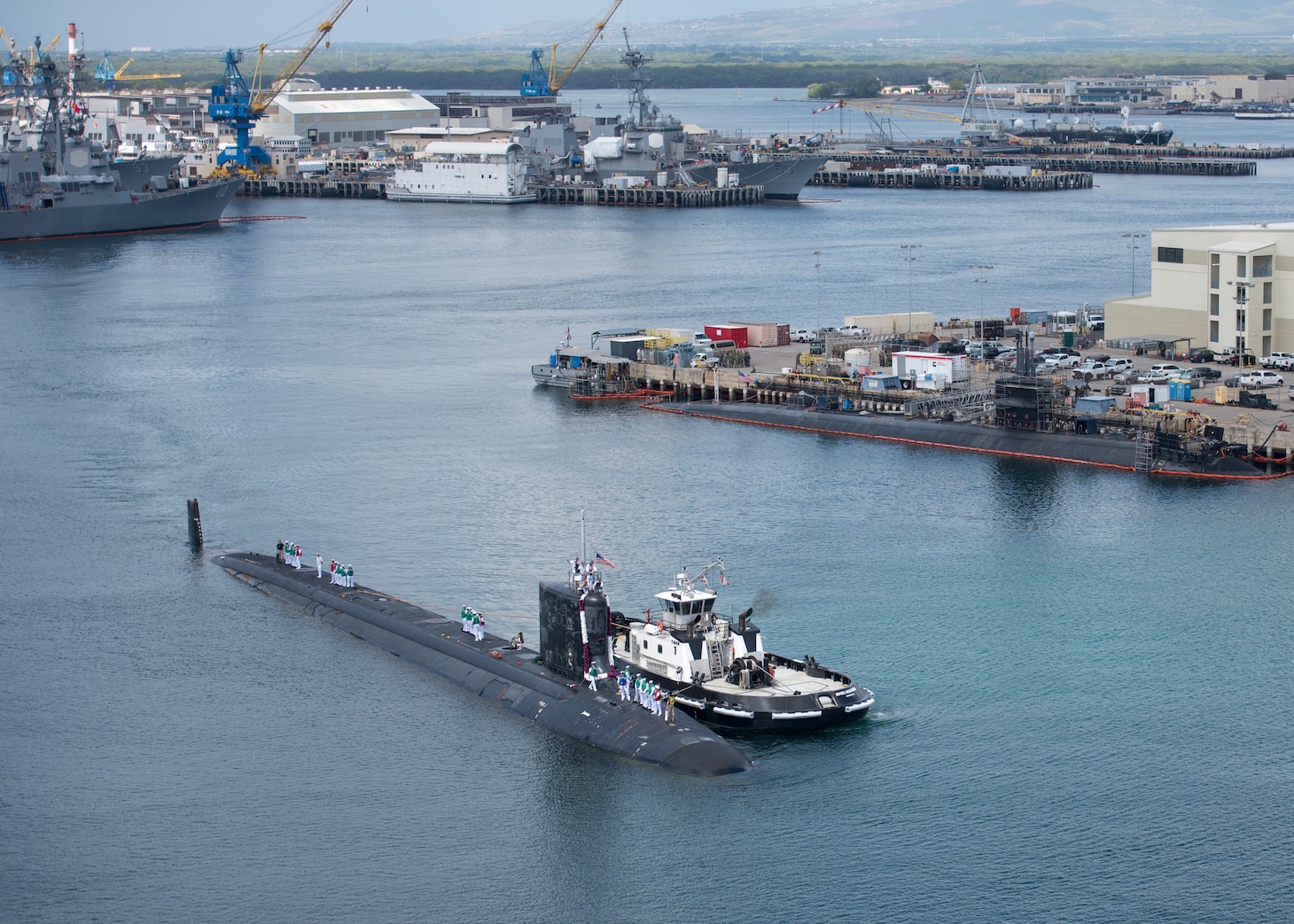 180330-N-LY160-0026 PEARL HARBOR, Hawaii (March 30, 2018) The crew of the Virginia-class fast-attack submarine USS Mississippi (SSN 782) returns to Joint Base Pearl Harbor-Hickam following a six-month Western Pacific deployment, March 30. (U.S. Navy photo by Mass Communication Specialist 2nd Class Michael H. Lee/ Released)