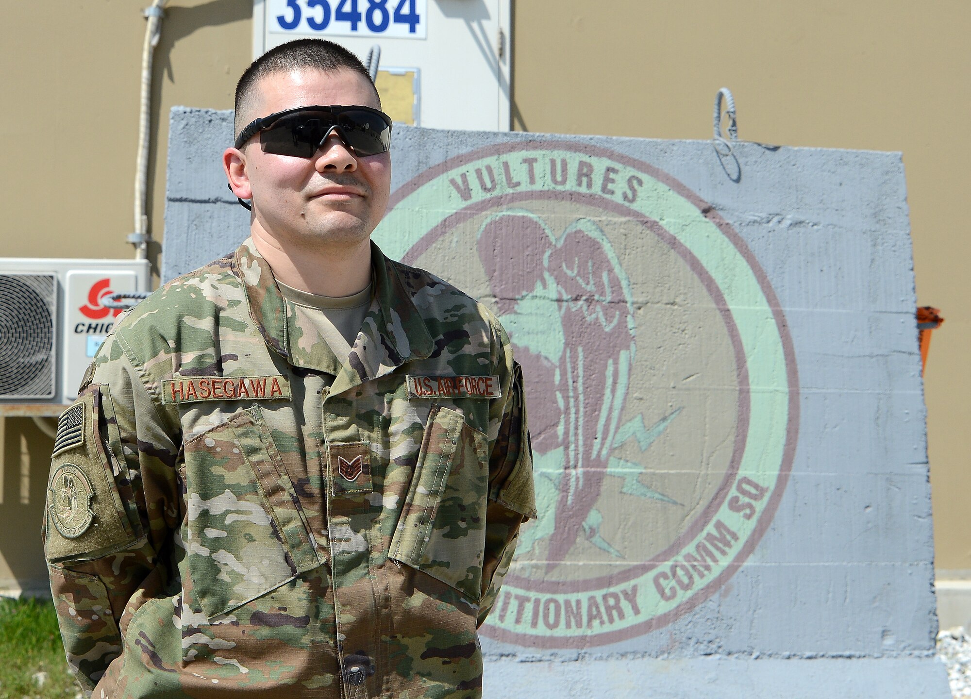 Staff Sgt. Brandon Hasegawa, 455th Expeditionary Communication Squadron cyber transport technician, poses for a photo Mar. 22, 2018 at Bagram Airfield, Afghanistan.