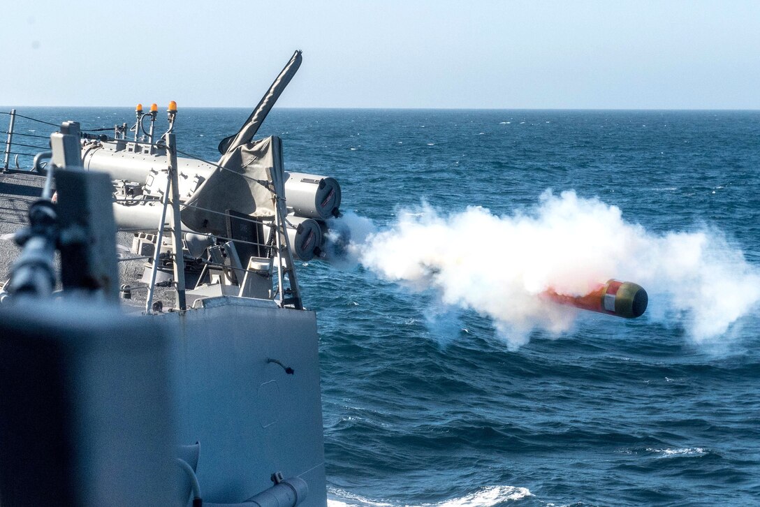 Sailors fire a Mark 46 lightweight torpedo.