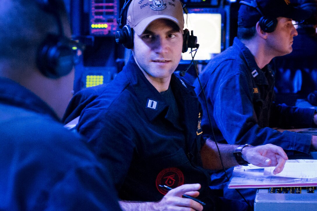 Sailors prepare for an air defense exercise.