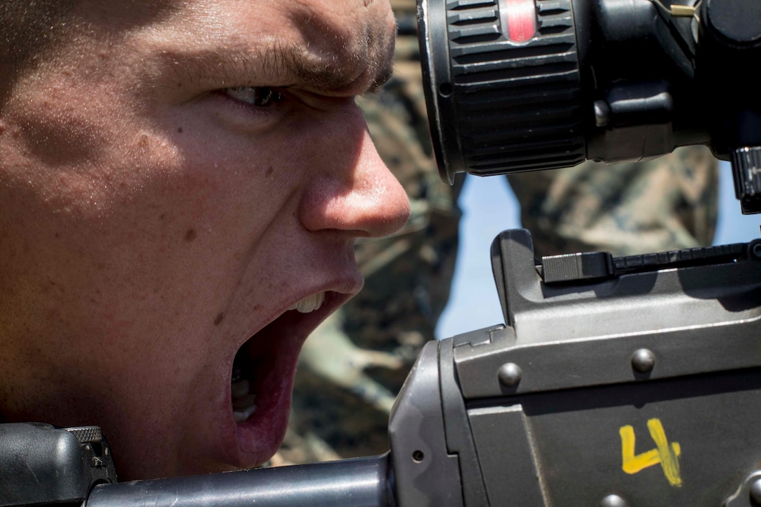 U.S. Marine Corps Lance Cpl. Christipher Watts, machine gunner, Battalion Landing Team 3/1, 13th Marine Expeditionary Unit, calls out a simulated misfire while aboard the Whidbey Island-class amphibious dock landing ship USS Rushmore at sea, April 29, 2018. The Essex Amphibious Ready Group and 13th MEU integrated to conduct the second major exercise of their pre-deployment training. ARG, MEU Exercise provides essential and realistic ship-to-shore training, designed to enhance the integration of the Navy-Marine Corps team. ARGMEUEX provides an opportunity to integrate unique individual and unit skills and develop the Essex ARG and 13th MEU’s collective proficiency in challenging and unfamiliar environments.