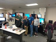National Telecommunications Week is April 8-14, Each year, the second full week of April is dedicated to the men and women who serve as public safety telecommunicators. It was first conceived by Patricia Anderson of the Contra Costa County (Calif.) Pictured are some of Security Battalions own telecommunicators.