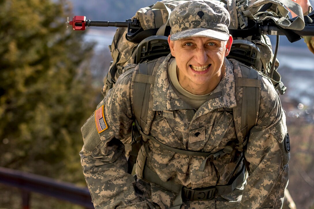 A soldier competes in the 12-mile ruck march.