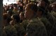 U.S. Air Force Airmen from the 325th Fighter Wing listen listen during an all-call.