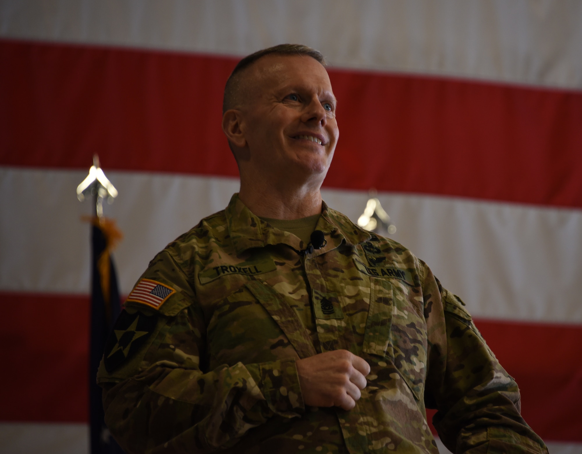 U.S. Army Command Sgt. Maj. John Wayne Troxell, Senior Advisor to the Chairman of the Joint Chiefs of Staff, smiles during all-call.