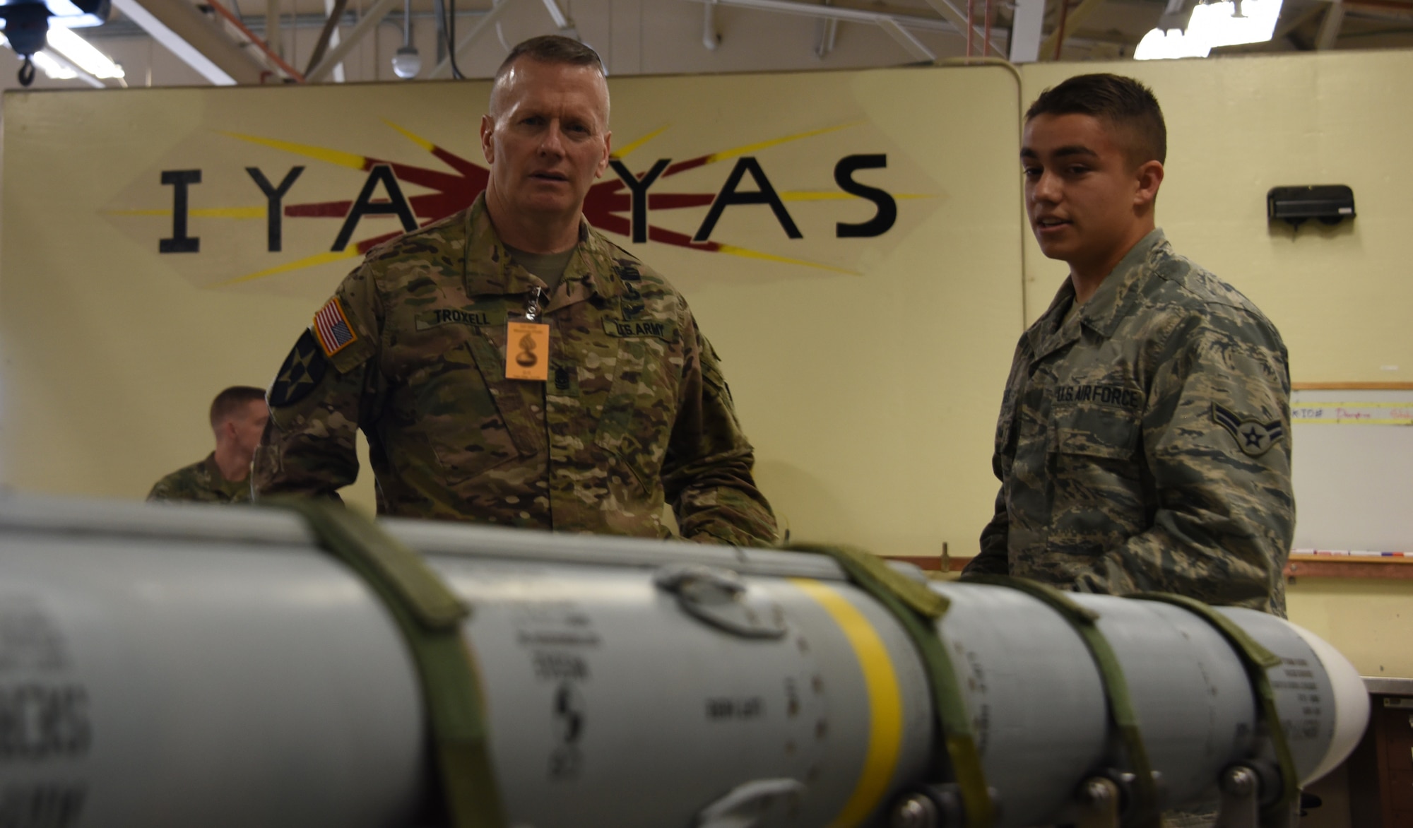 U.S. Army Command Sgt. Maj. John Wayne Troxell, Senior Advisor to the Chairman of the Joint Chiefs of Staff, receives a brief.